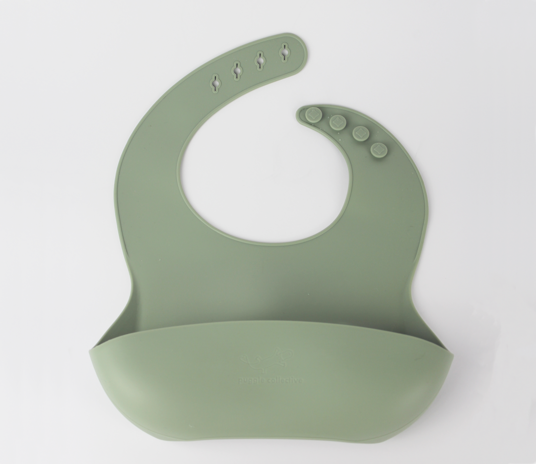 Silicone Bib with Food Pouch Bush Sage Puggle Collective PuggleCollective BPA Free Silicone Tableware toys kids childrens baby gift gifting games baby weaning baby feeding plate bowl drinking suction plate suction bowl Non-stick